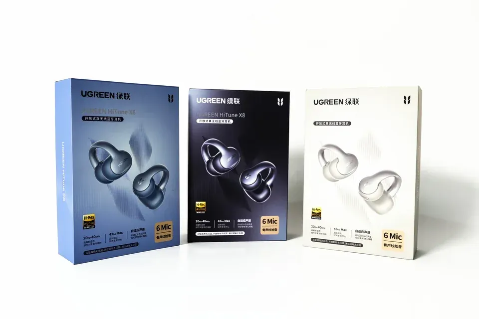 UGREEN earbud boxes in blue, black and white