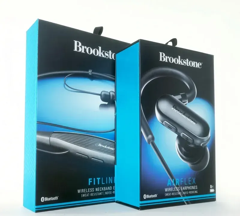 Two Brookstone earphone boxes with sleeves and pull tabs